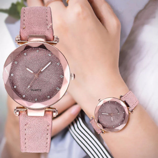 Elegant women's wrist watch with a captivating starry sky dial and leather strap, suitable for any occasion.