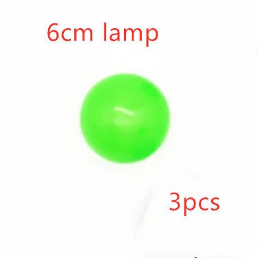 Colorful, luminous stress relief balls with a sticky surface for bouncing, squeezing, and sticking to surfaces