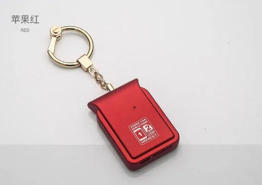 Black leather Bluetooth Dual SIM Adapter keychain with Nano SIM slot and Micro USB port.