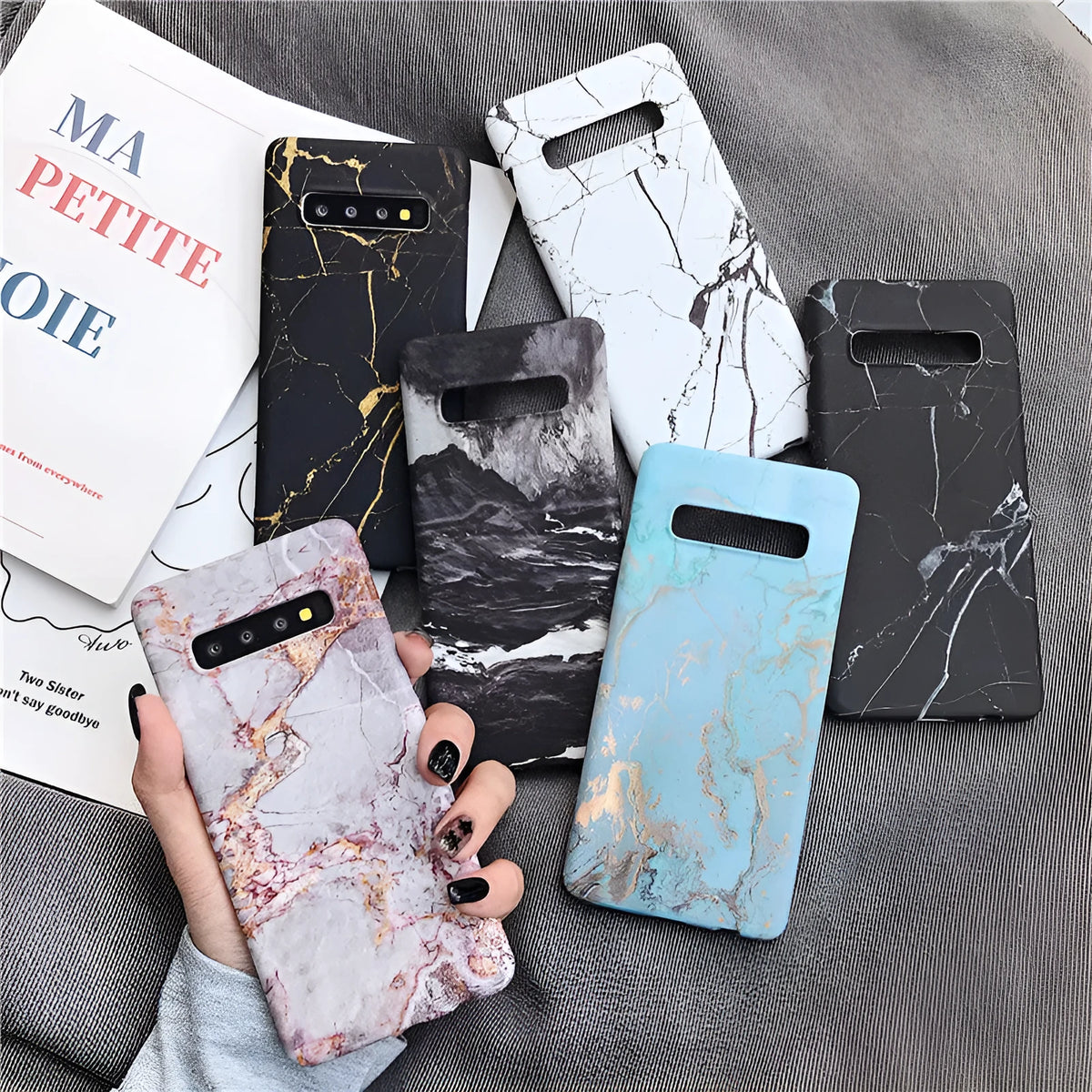 Samsung phone case with white and grey marble pattern on a polycarbonate back cover.