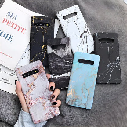 Samsung phone case with white and grey marble pattern on a polycarbonate back cover.