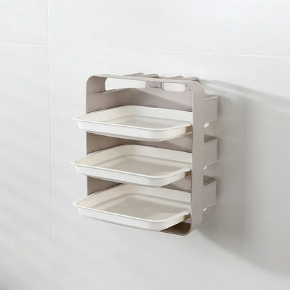 Wall-mounted kitchen shelf with stackable trays in navy blue, white, and coffee colour options