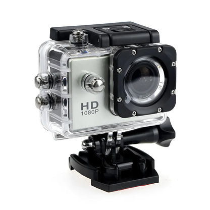 White waterproof sports camera next to its waterproof case and mounting accessory.