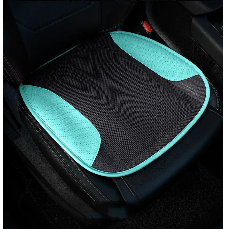 USB ventilated car seat cushion in black suede with visible fan vents, placed on a car seat.