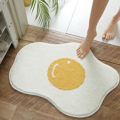 Stylish and absorbent egg-shaped doormat in various sizes and colors, made of plush polyester with a non-slip rubber backing