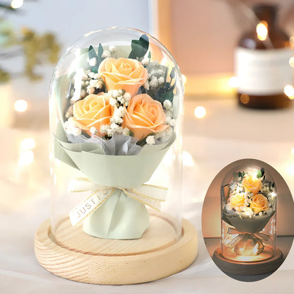 Soap flower bouquet in glass cover with red rose arrangement measuring 16cm height