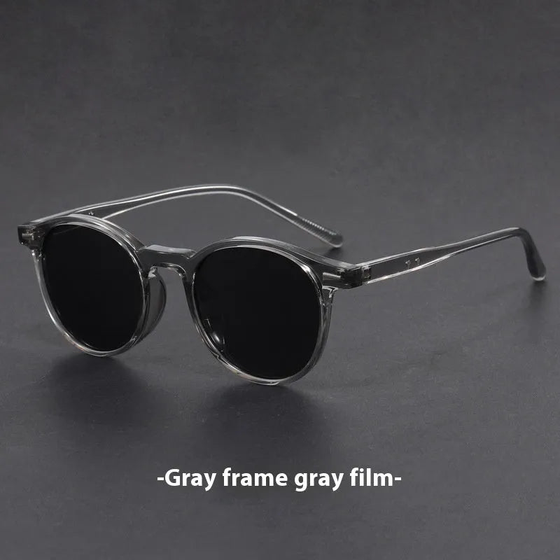 Ultra-light round frame retro sunglasses with polarised grey lenses in multiple colour options