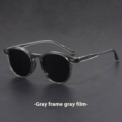 Ultra-light round frame retro sunglasses with polarised grey lenses in multiple colour options
