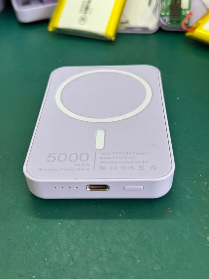 White magnetic wireless charging power bank showing compact size and creative design.