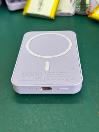 White magnetic wireless charging power bank showing compact size and creative design.