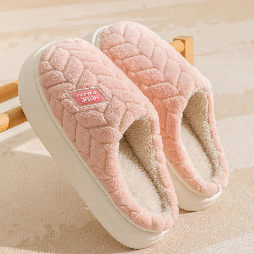 Cosy plush slippers with thick, non-slip soles and fleece lining, available in a variety of stylish colours