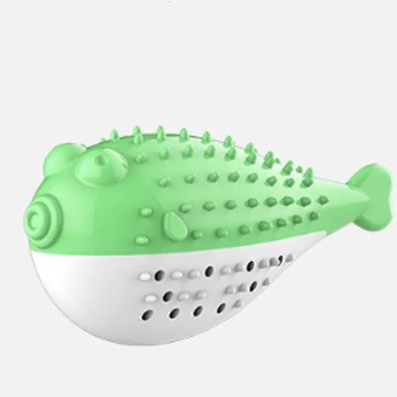 Mint Toys blue silicone fish-shaped cat chew toy on a wooden floor.