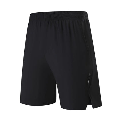 Men's black nylon sports shorts with mid-waist, shown flat.