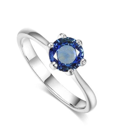 Close-up of a beautiful rose gold ring with sparkling zircon stones
