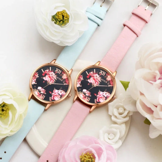 Elegant rose gold women's watch with leather strap and love heart design