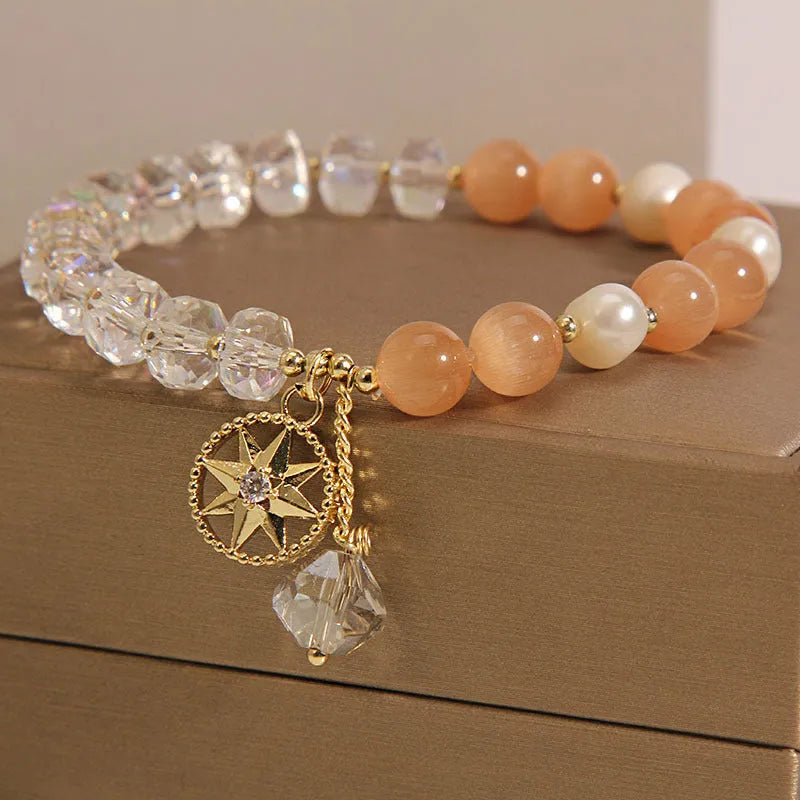 Orange eight Awn star bracelet with gold-plated inlay and artificial gemstones