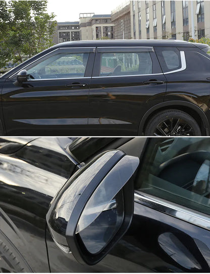 Black engineering plastic window deflectors installed on a 2023 Mitsubishi Outlander.