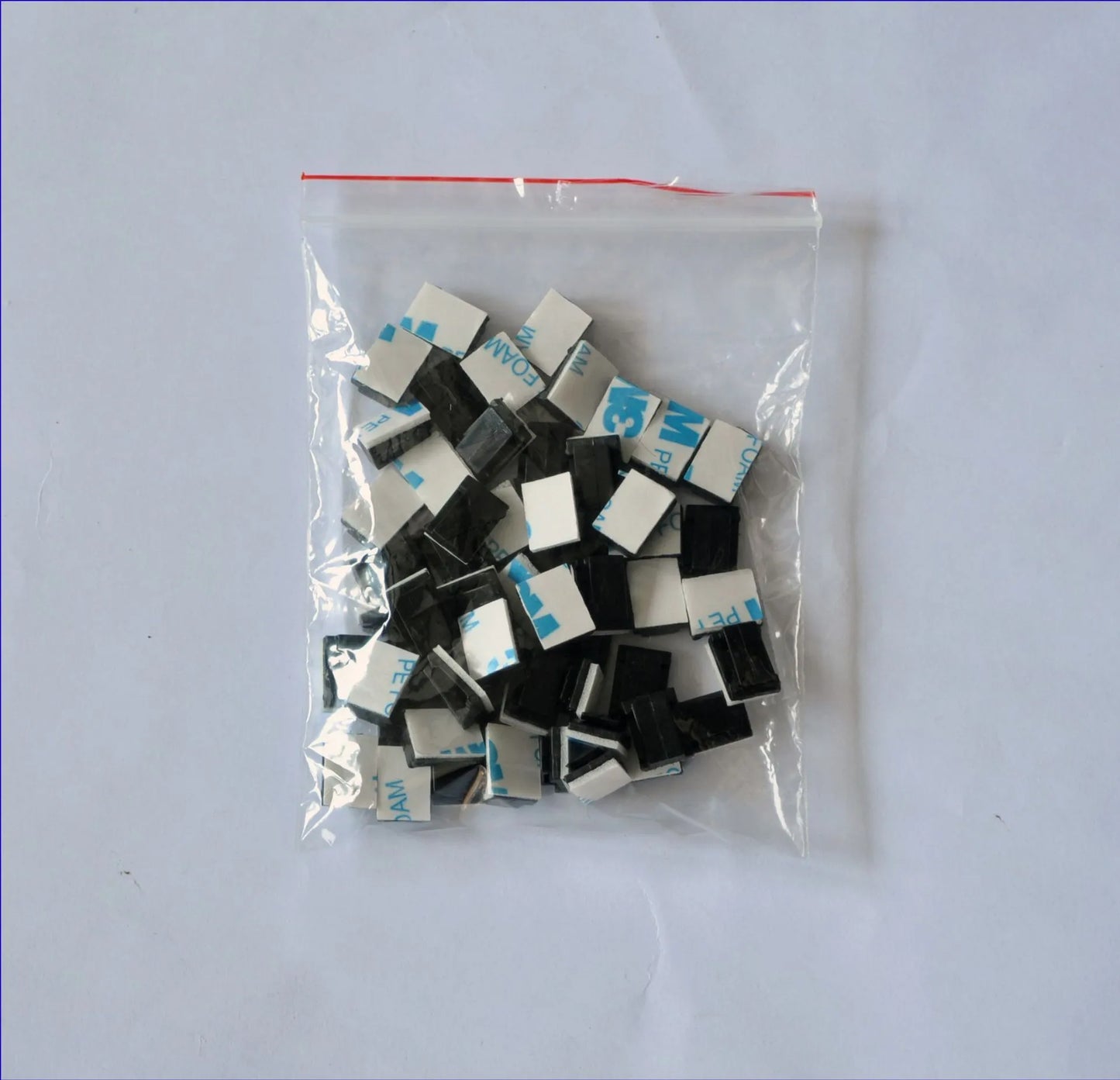 Black PA66 nylon car wire retaining clip for managing automotive and LED electronic cables.