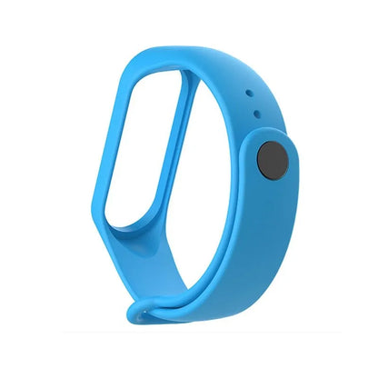 Colourful silicone replacement strap for XIAOMI MI Band 3 smart watch on a wrist.