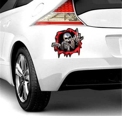 Reflective metal skull car sticker with colourful broken shell design measuring 15 by 14 cm