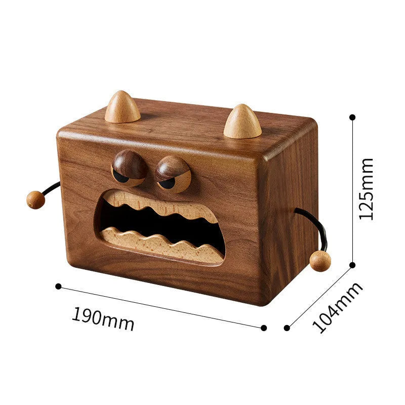 Wooden tissue box with cartoon monster design in walnut and beech colours