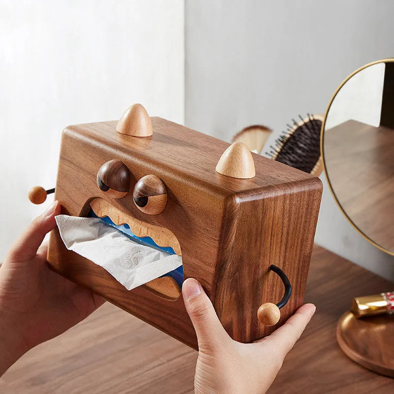 Wooden tissue box with cartoon monster design in walnut and beech colours