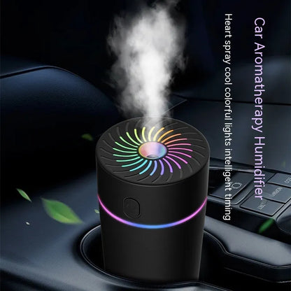 Compact car USB humidifier with aromatherapy function showing water reservoir and control buttons