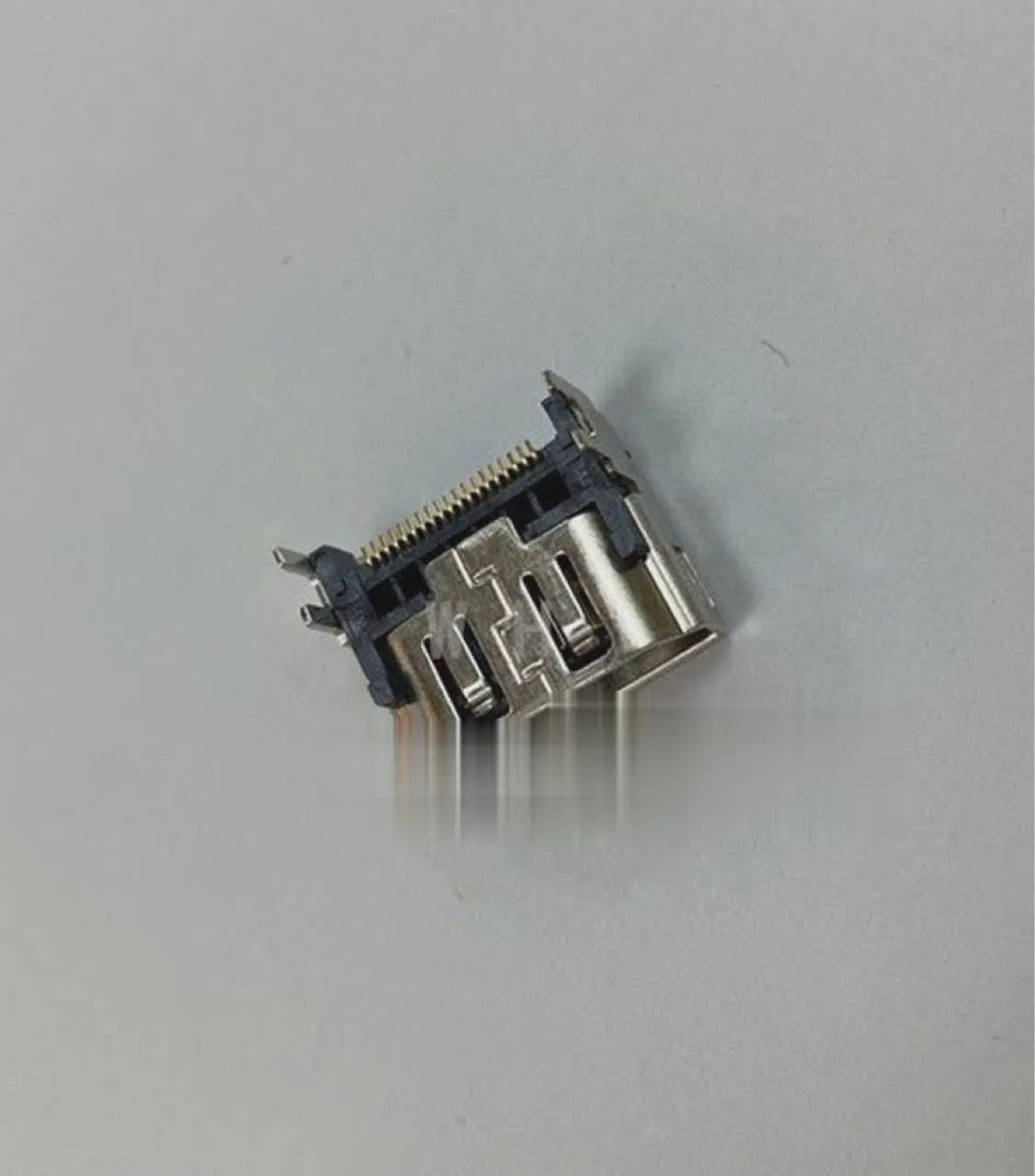 Silver HDMI interface host socket with Type A female port for game console and media device connections