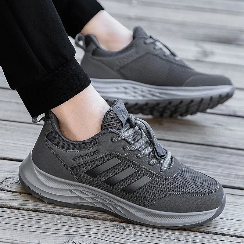 Unisex slip-on casual shoes with mesh upper and elastic band in various colours.