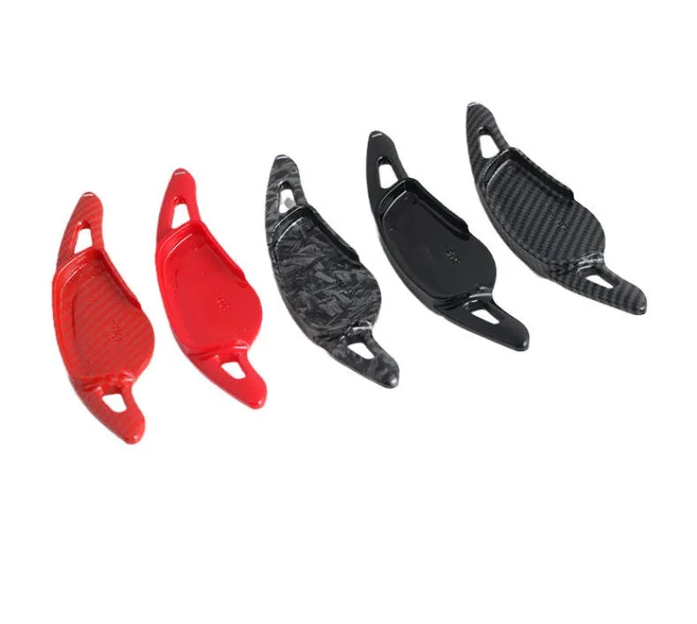 Carbon fibre steering wheel paddle shifters for car interior modification available in carbon fibre black, carbon fibre red, forged pattern, passion red, and piano black colour options made from ABS material for easy installation upgrade