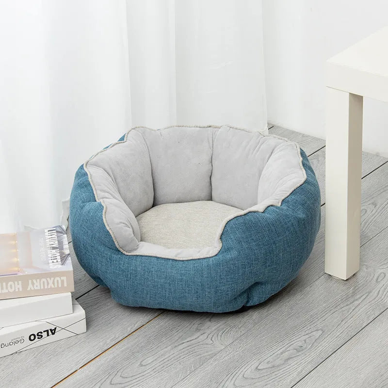 Octagonal fabric pet bed for small dogs and cats with a removable centre mat