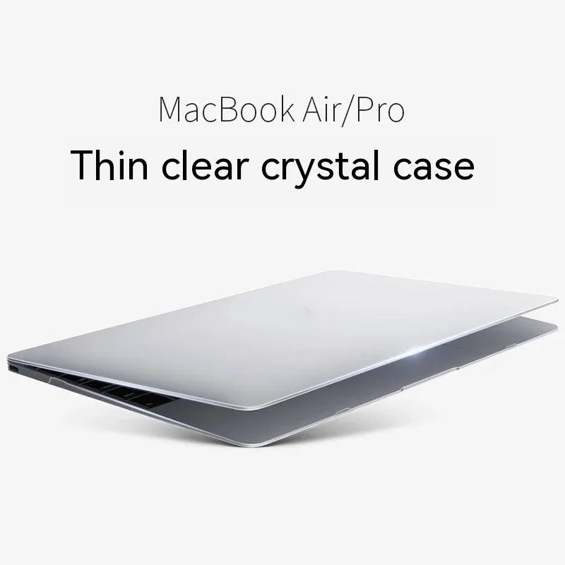 MacBook protective case in crystal transparent and frosted black finishes on a laptop.
