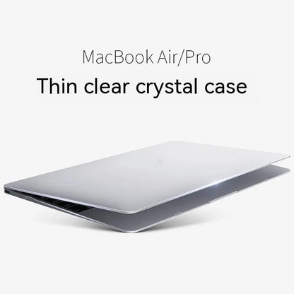 MacBook protective case in crystal transparent and frosted black finishes on a laptop.
