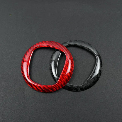 Carbon fiber steering wheel cover shown in black and red colour options for vehicle interior enhancement