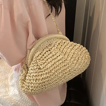 Women's straw beach shoulder bag with chain details in khaki colour