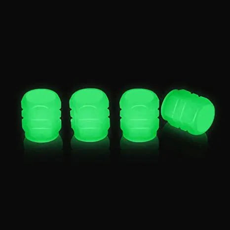 Glow-in-the-dark rubber tyre valve caps in five colour options on tyre valve stem