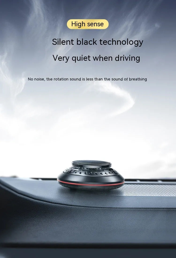Solar-powered aluminium car air purifier with essential oil bottle and beech wood chips for odour removal.