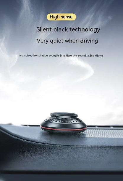 Solar-powered aluminium car air purifier with essential oil bottle and beech wood chips for odour removal.