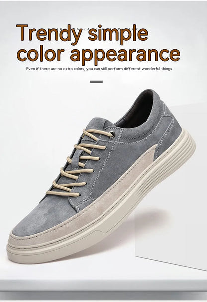 Men's grey low-top casual leather skate shoes with round toe and flat rubber sole on a neutral background.