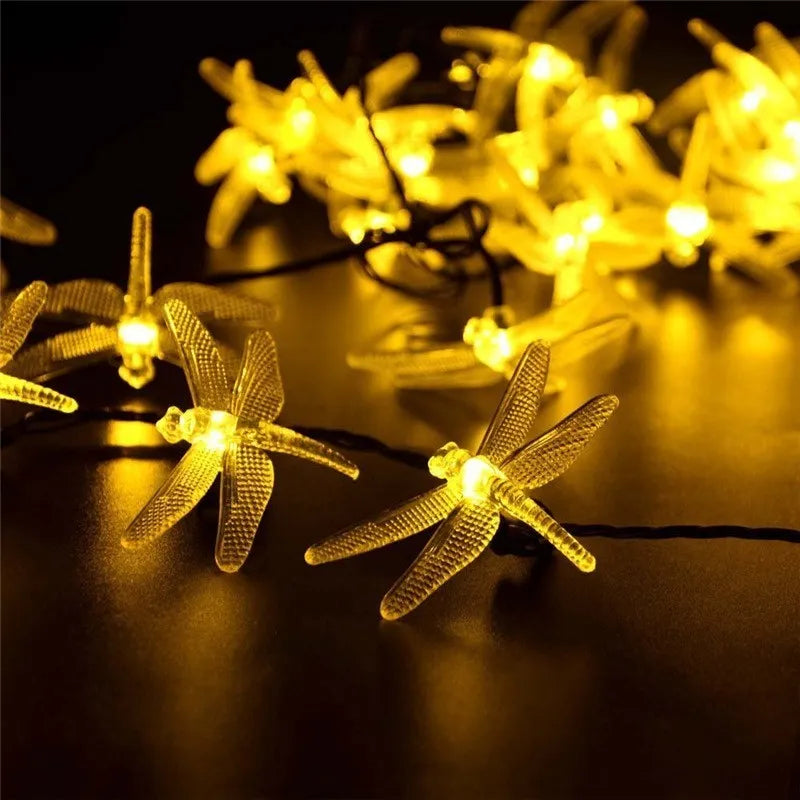 20 warm white LED dragonfly solar string lights with solar panel on garden spike