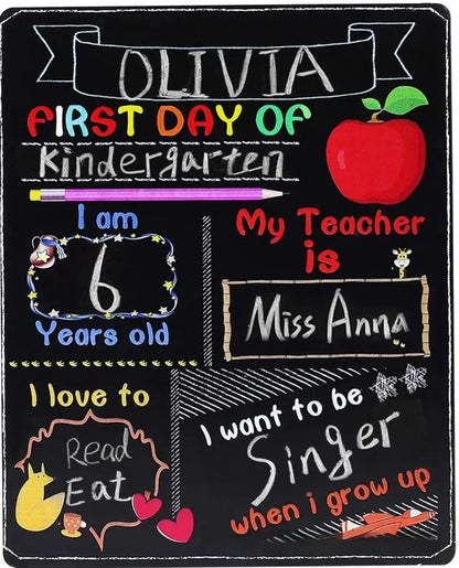 Wooden first day of school blackboard sign on a natural wood background.