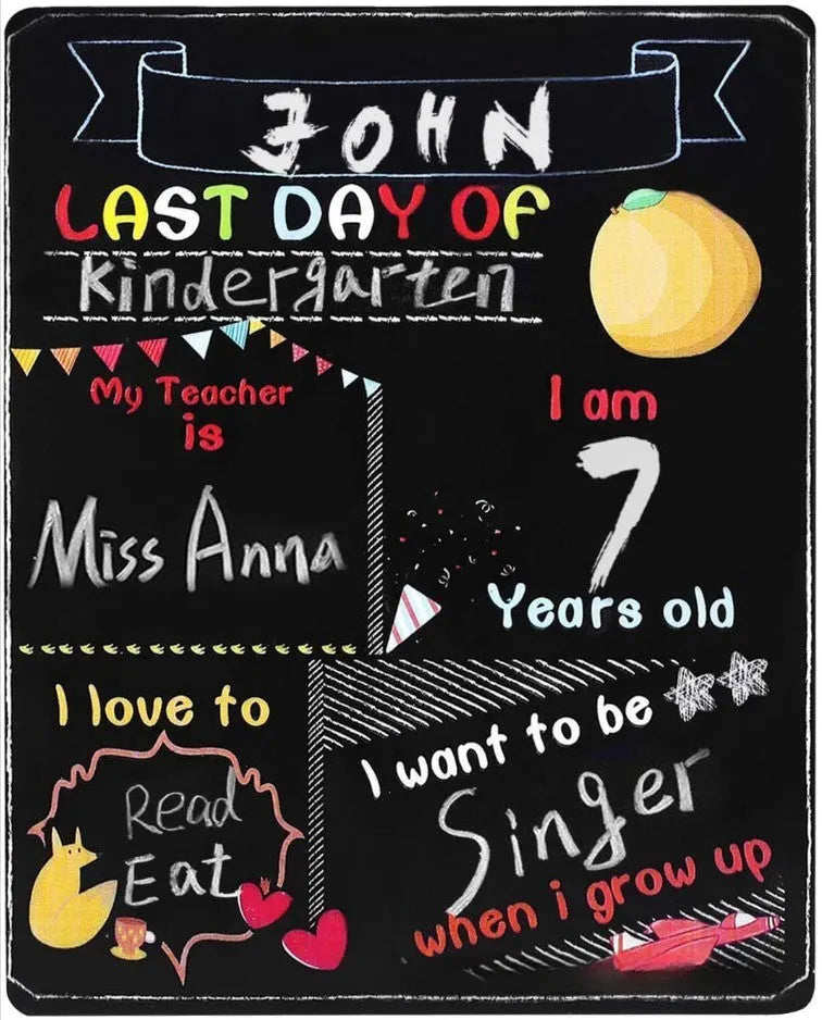 Wooden first day of school blackboard sign on a natural wood background.