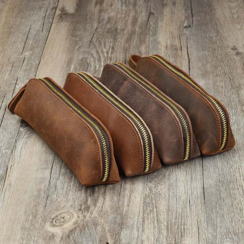 Square leather pencil case in genuine cowhide measuring 18cm with zipper closure