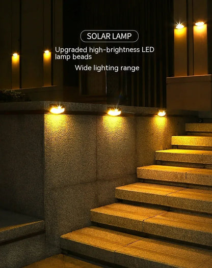 Solar outdoor wall lamp with smiling face design, dimensions 153mm by 76mm by 38mm