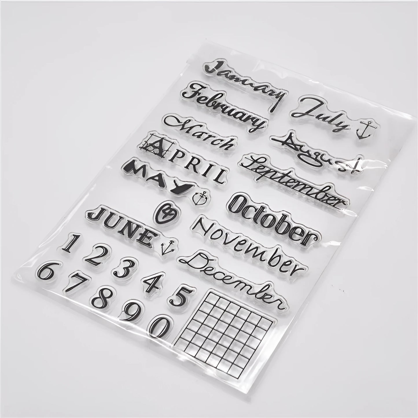 Transparent silicone craft seal with a vintage calendar icon design for paper stamping.