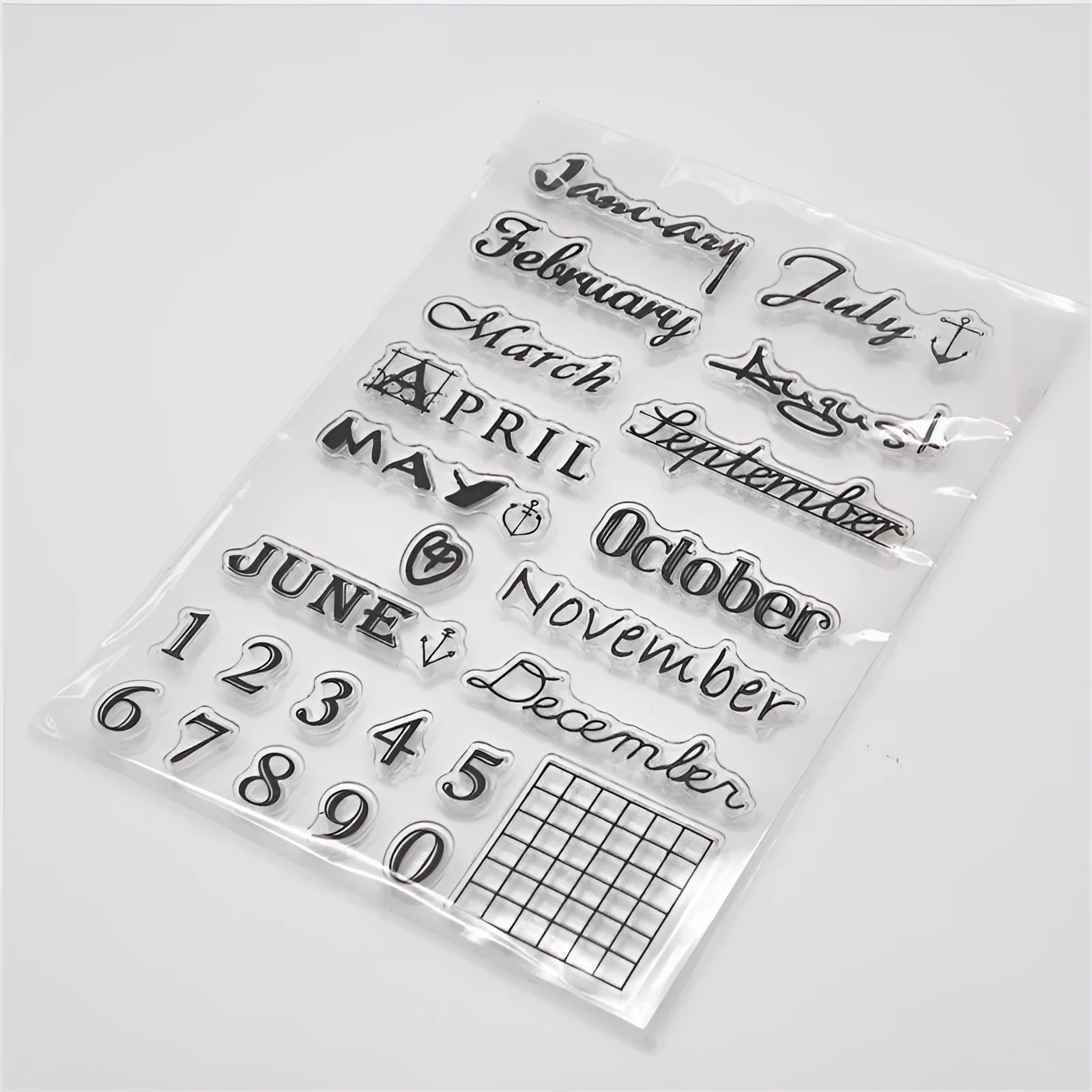Transparent silicone craft seal with a vintage calendar icon design for paper stamping.