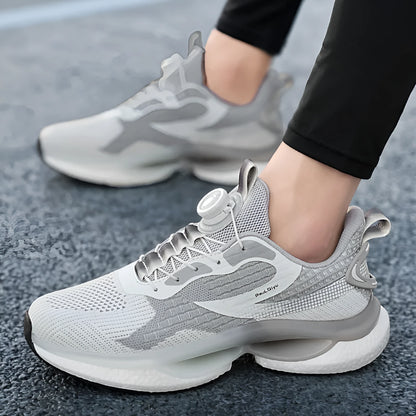 Men's white low-top running sneakers with a buckle fastener and mesh upper.