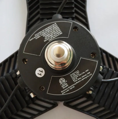Industrial foldable waterproof LED garage lamp showing aluminium body and plastic casing.