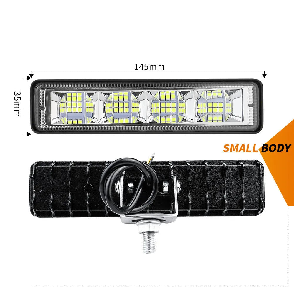 Four compact aluminium LED work lights in work light white colour, suitable for vehicle mounting.