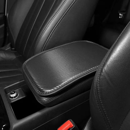 Leather automotive armrest box mat for car centre console protection.